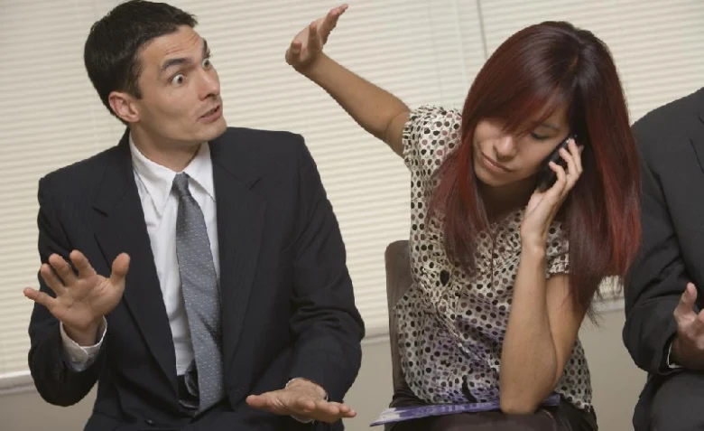 People reacting in office setting