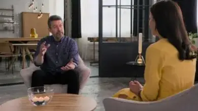 Two people talking in modern room