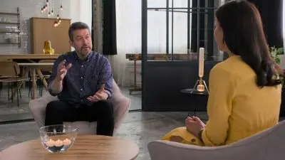 Two people talking in modern room