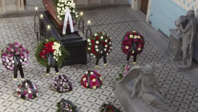 Funeral wreaths and flowers on casket