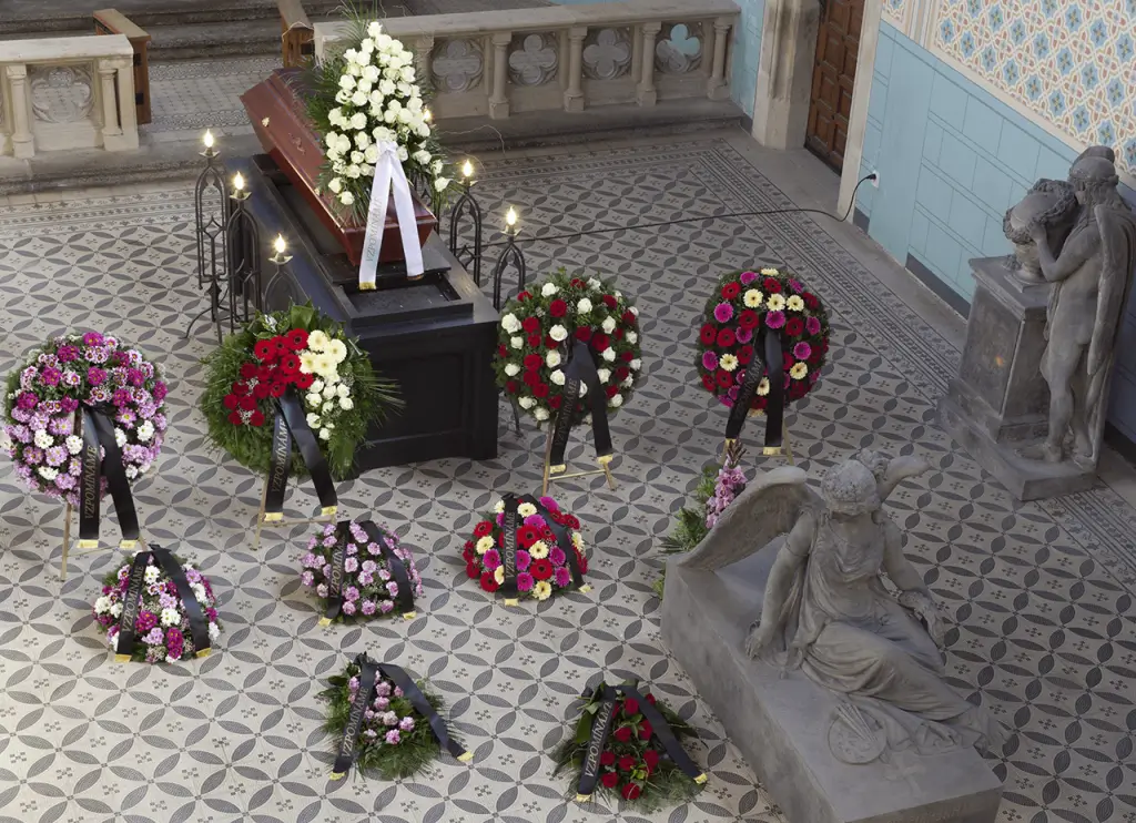 Funeral wreaths and flowers on casket