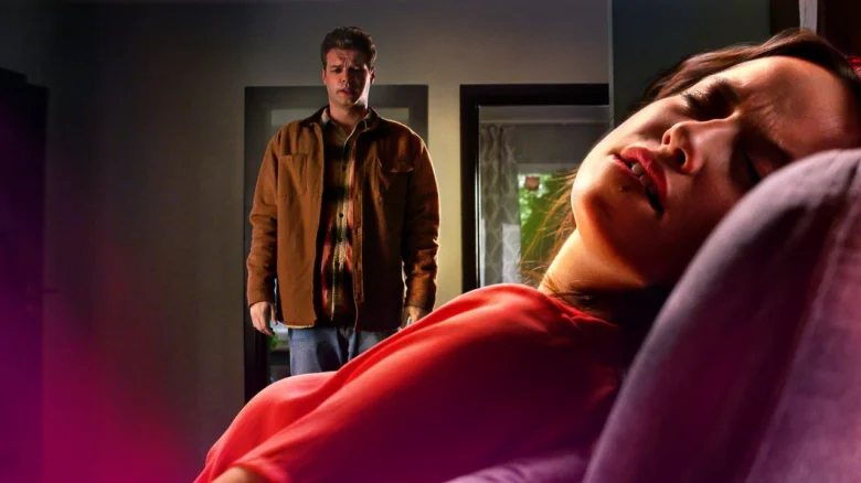 Man and woman in bedroom scene