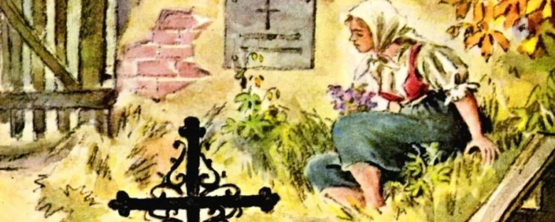 Žena v tradičním oděvu sedí u hrobu na hřbitově.
