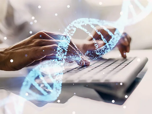 Ruční psaní na klávesnici s vizuálním efektem DNA pro vědecký článek.