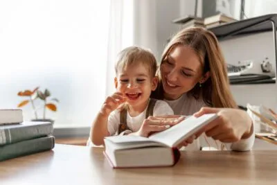 Mother and child reading book