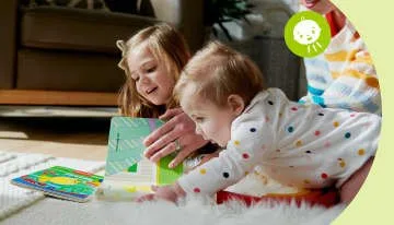 Mother and baby reading book