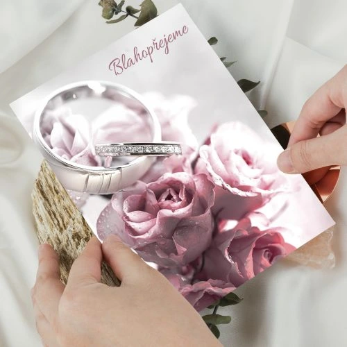 Wedding card with rings and roses