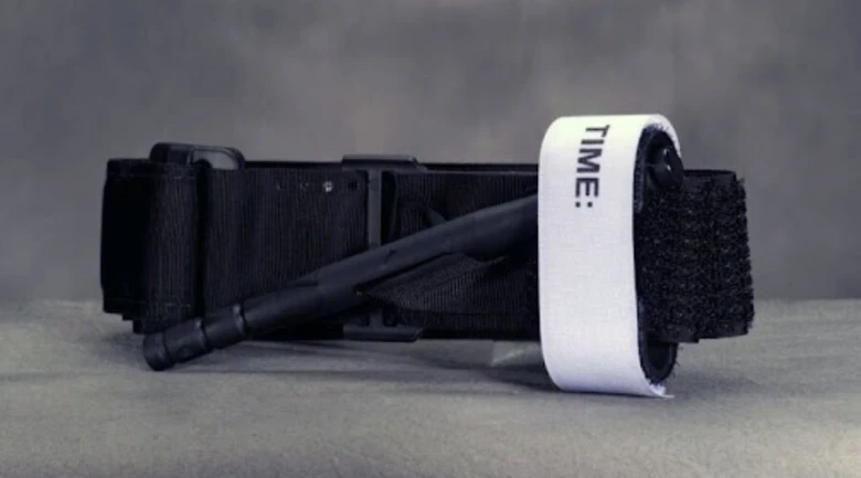 Tourniquet with strap and stick