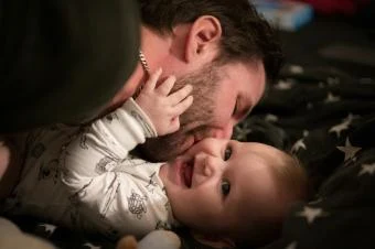 Man and baby lying down