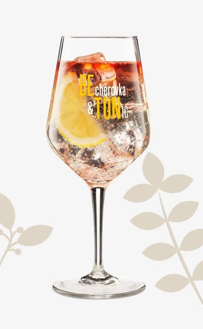 Becherovka cocktail with lemon and ice