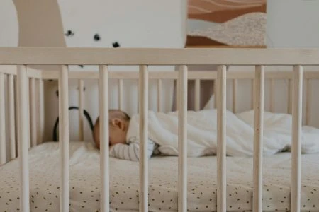 Baby sleeping in crib